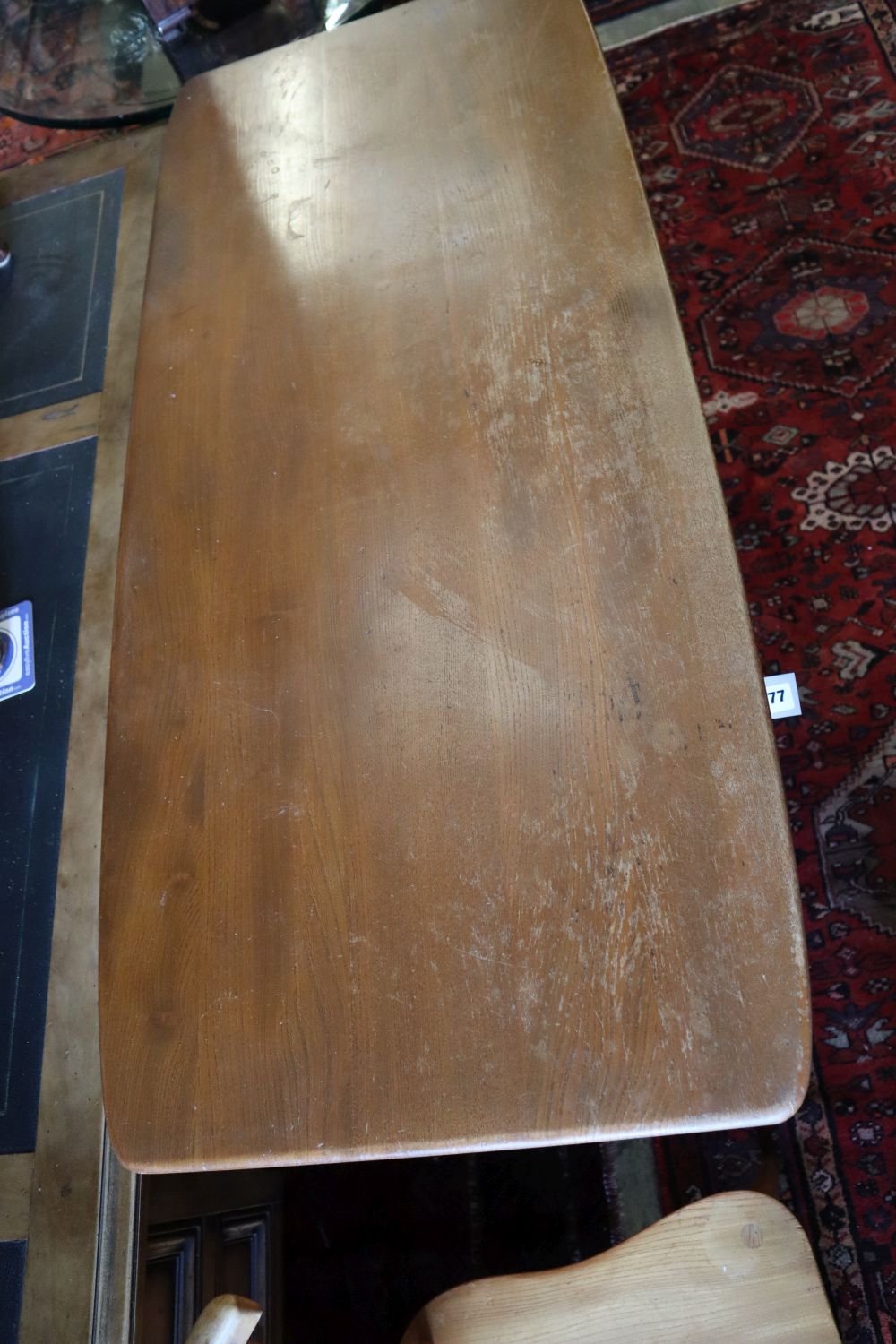 An Ercol sideboard, width 114cm, depth 50cm, height 81cm